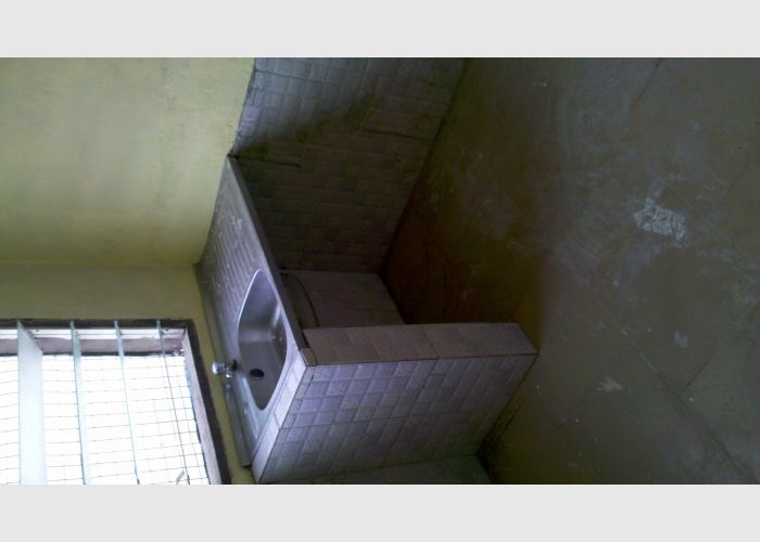 a neat chamber and hall self-contained for rent at spintex